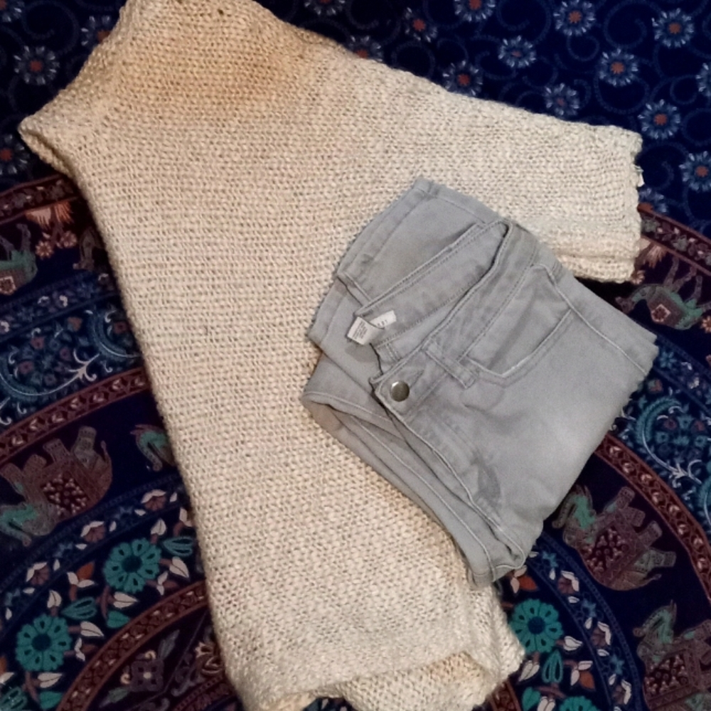 Calvin Klein sweater with gray jeans